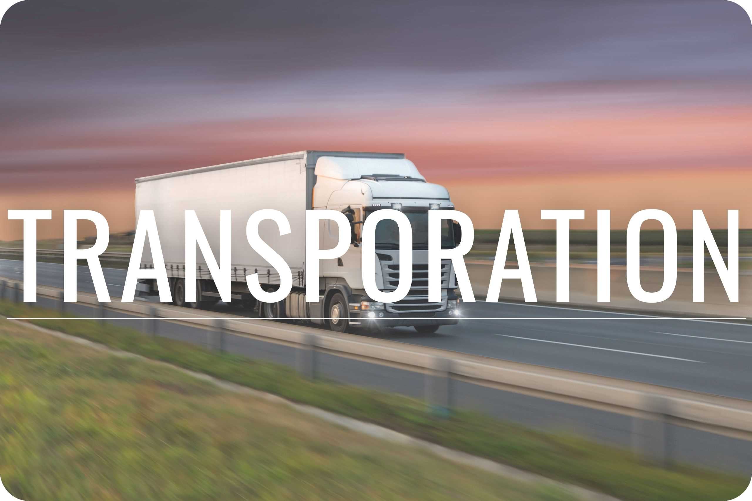 Transportation A semi-truck driving on a highway.