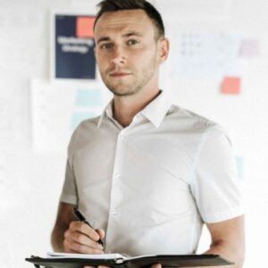 A man holding a clipboard.