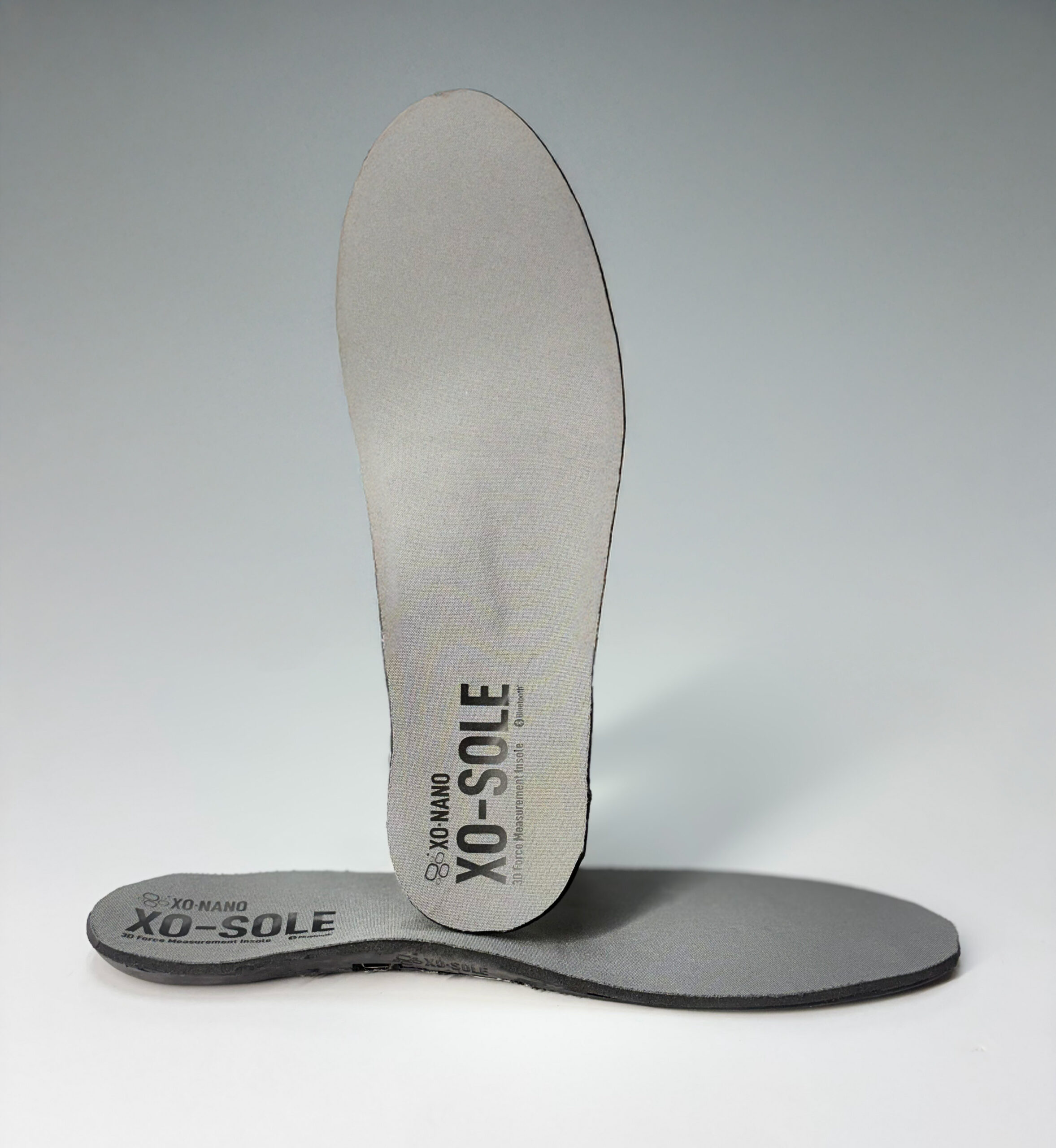 XO-SOLE Graphic A pair of XO-SOLE PRO insoles against our Smartfoam "O's" background.